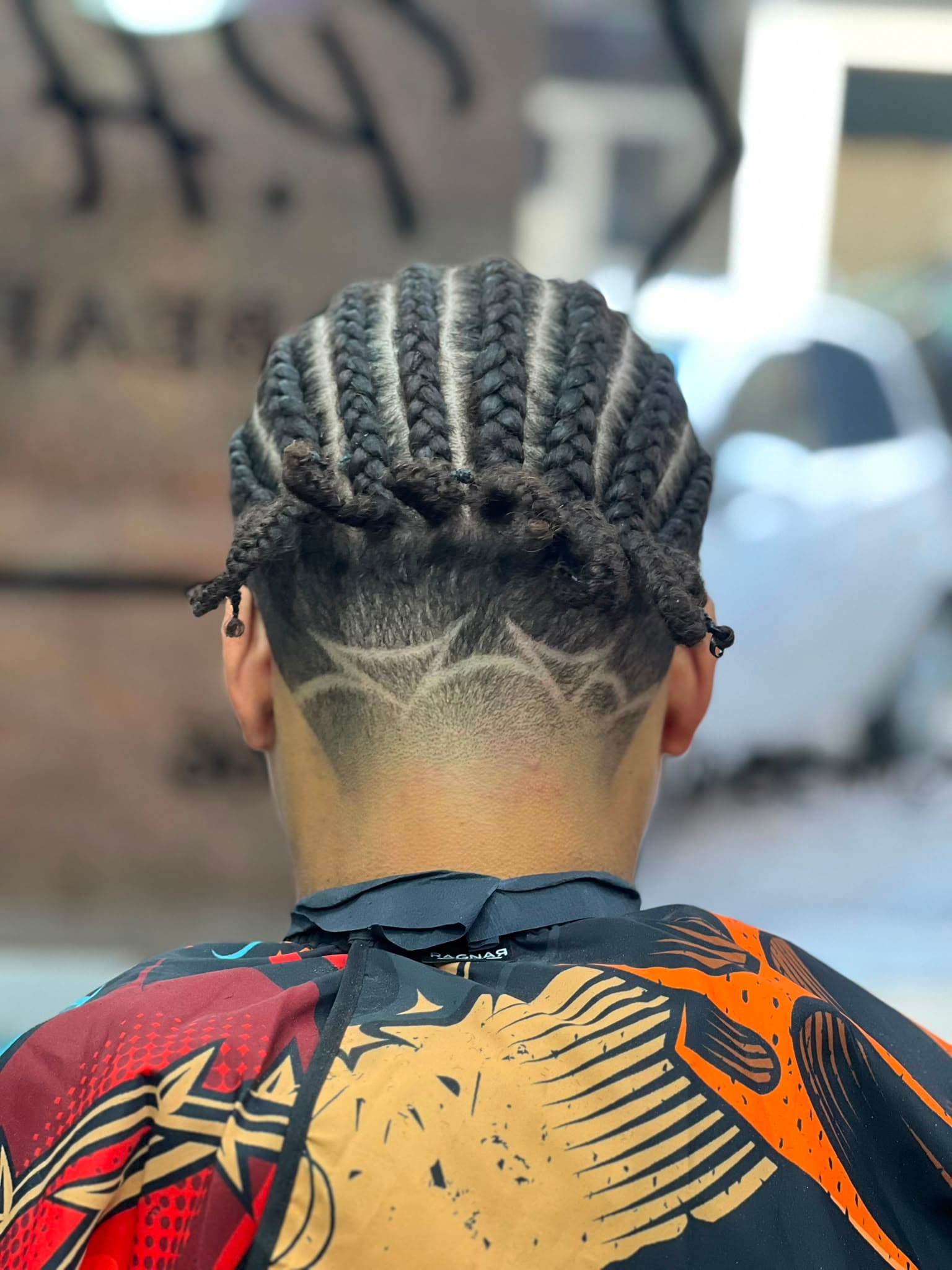 Cliente na cadeira da barbearia